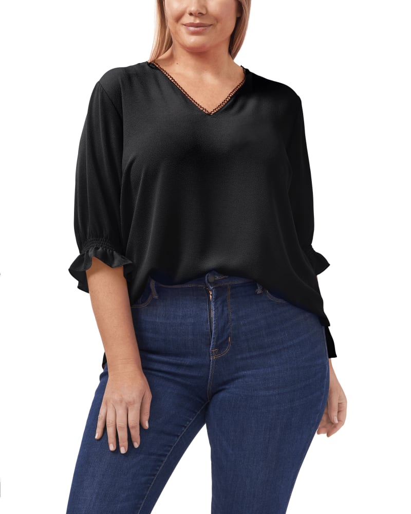Front of a model wearing a size 1X Lorie Ruffle-Sleeve Blouse in 060-RICH BLACK by CeCe. | dia_product_style_image_id:263429